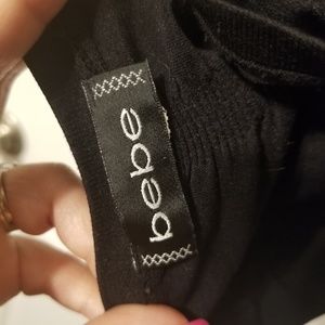 bebe Tops - Bebe black sleeveless turtle neck bebe Tops - Bebe black sleeveless turtle neck